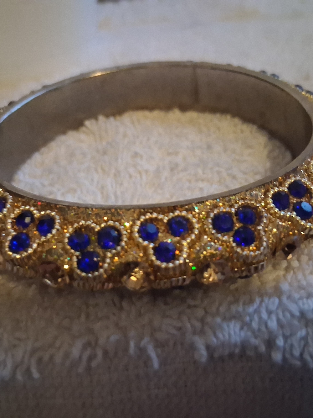 Gold-Tone Bangle Bracelet with Blue Crystal Accents